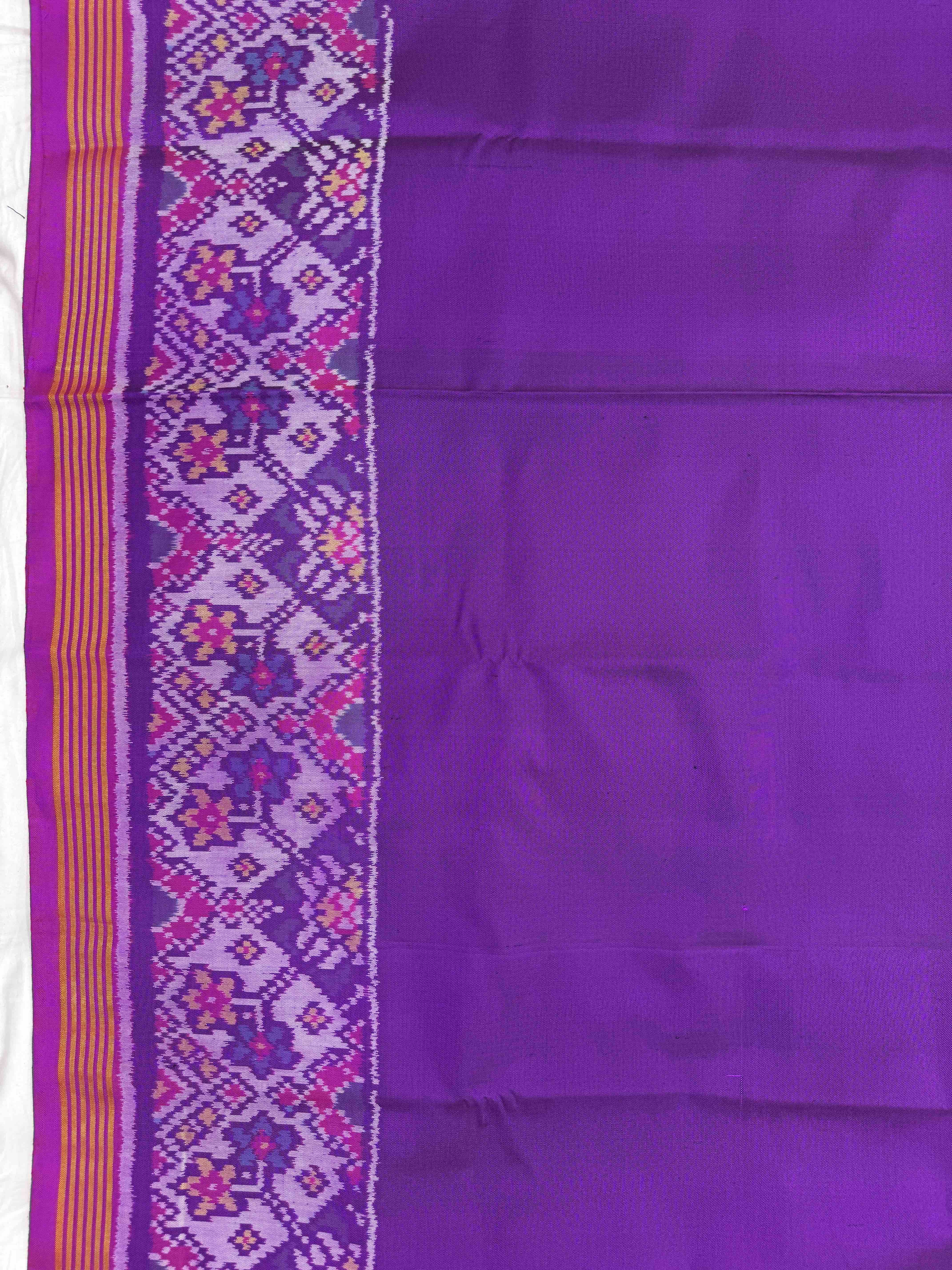 Purple Plain with Navratan Border Pallu Single Ikat Patan Patola Saree