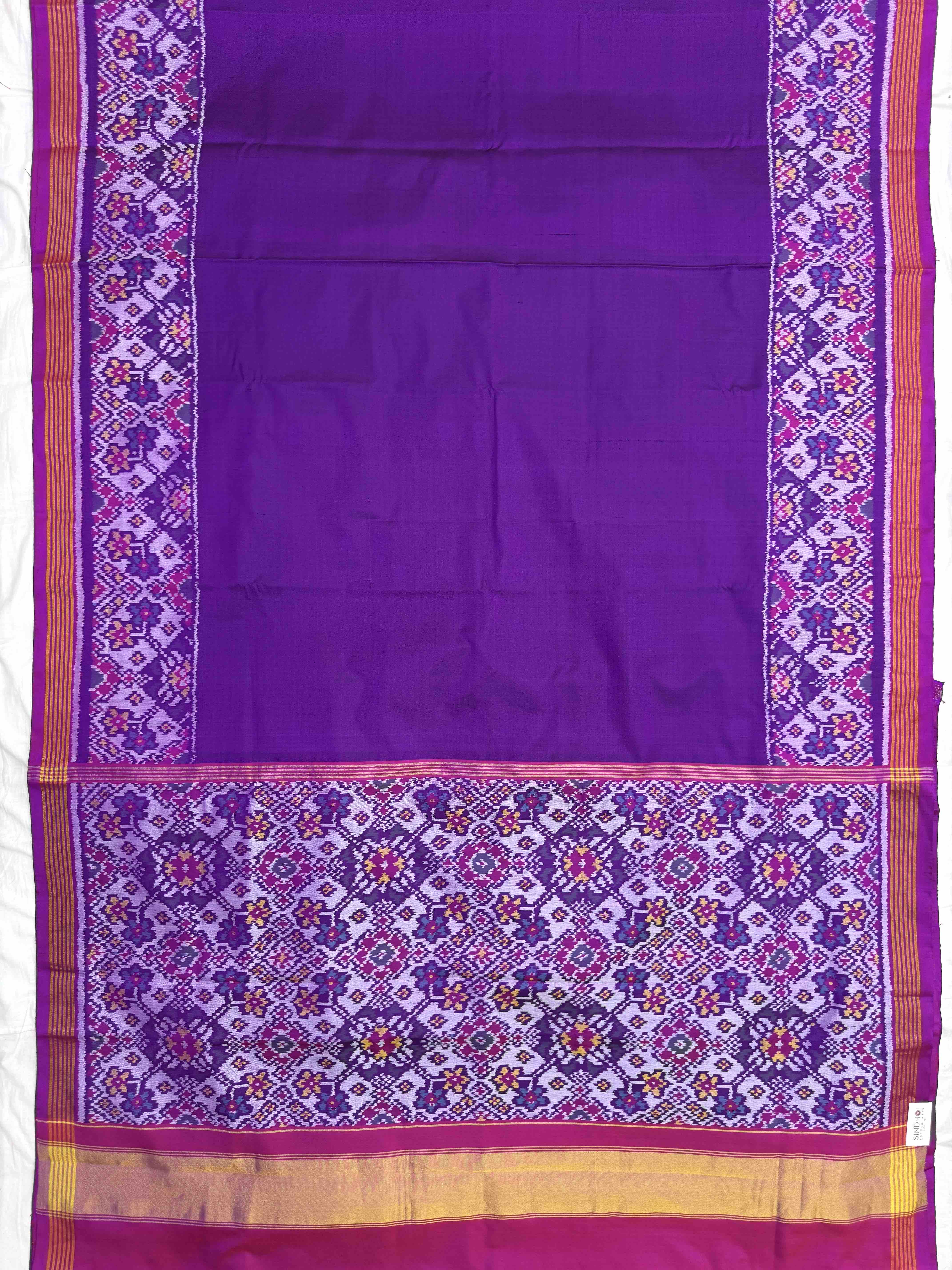 Purple Plain with Navratan Border Pallu Single Ikat Patan Patola Saree