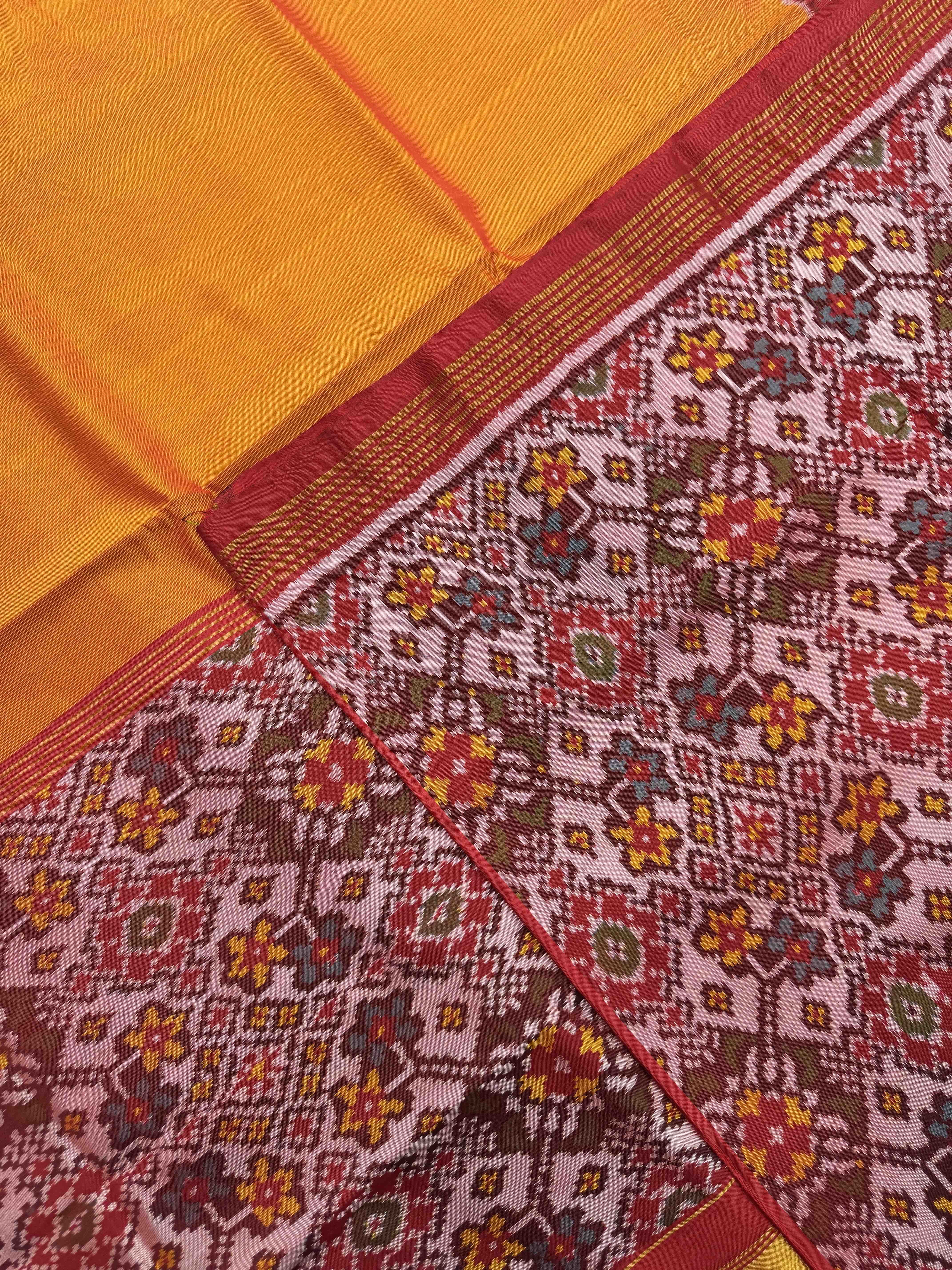 Mustard Yellow Plain with Navratan Border Pallu Single Ikat Patan Patola Saree