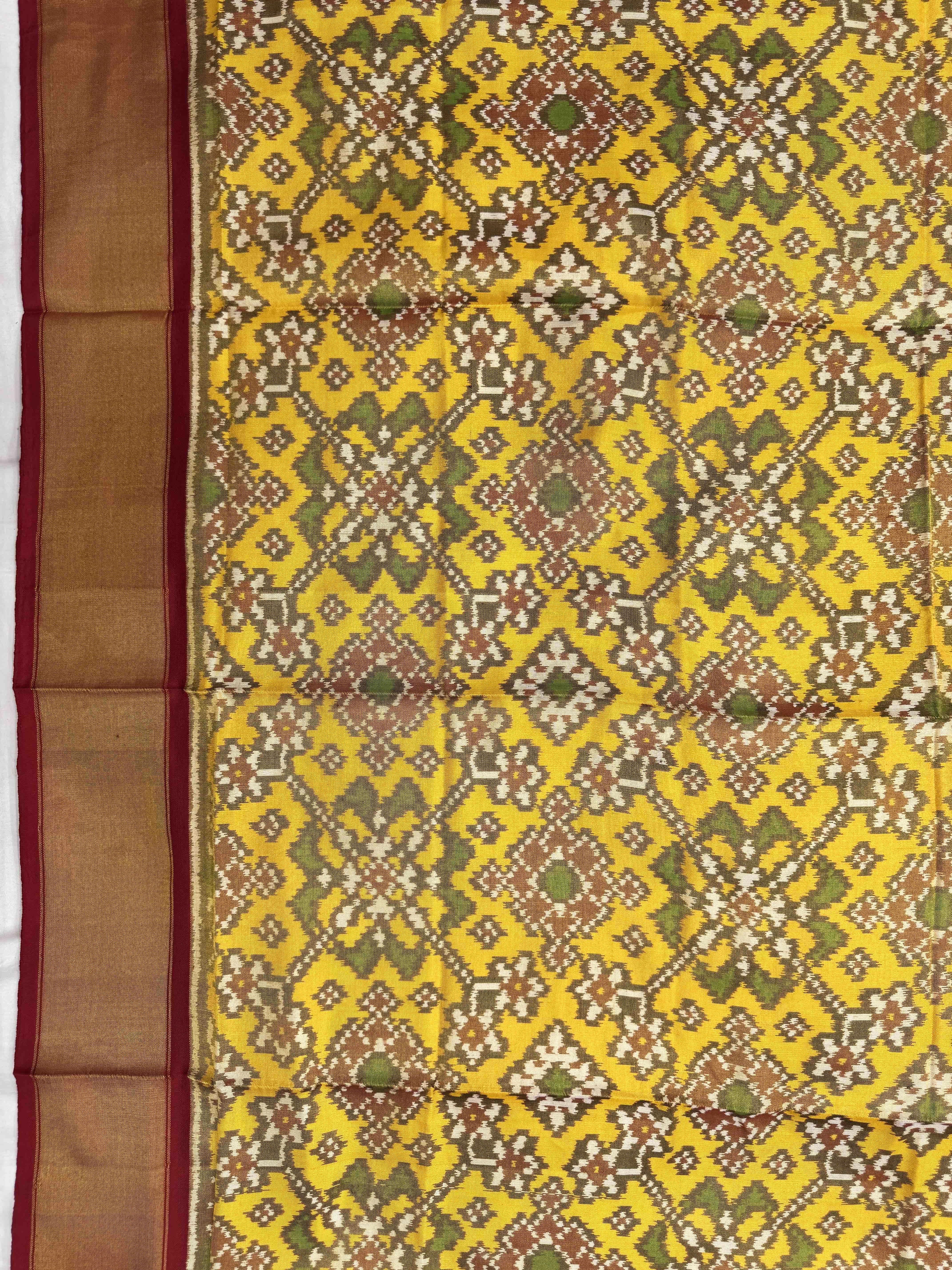 Yellow Navratan Tissue Semi Double Ikat Patola Blouse Piece
