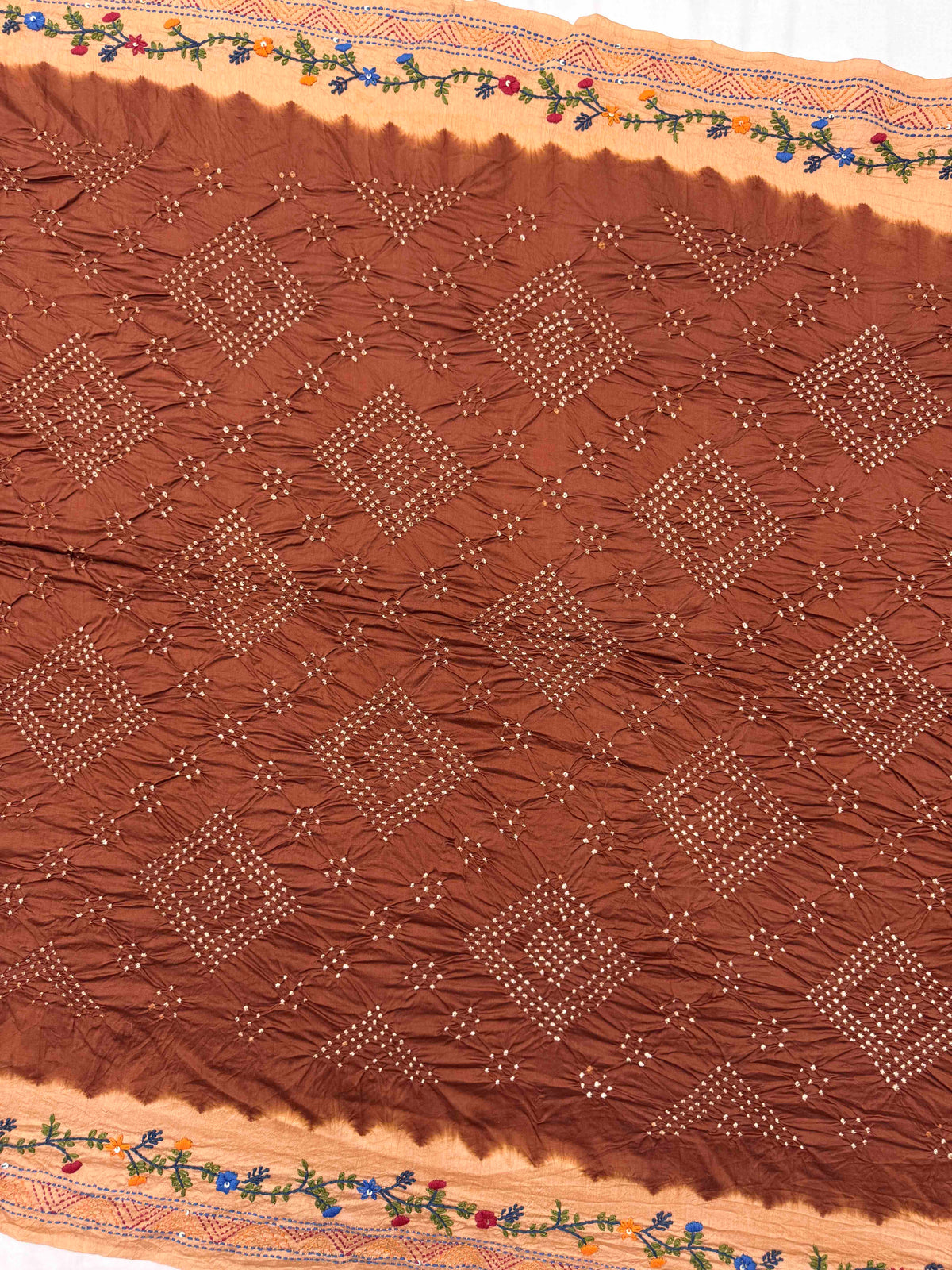 Light Orange & Brown Muga Silk with Kantha Work Border Pallu Bandhani Saree