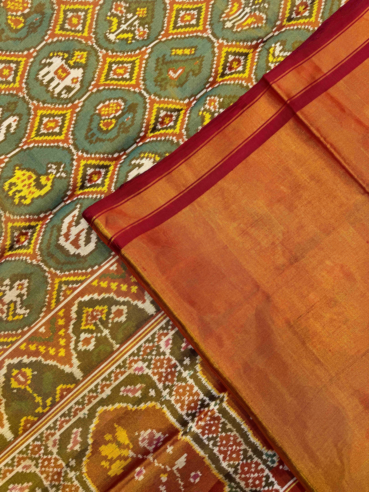 Red & Golden with Turquoise Small Narikunj Circle Tissue Patola Saree