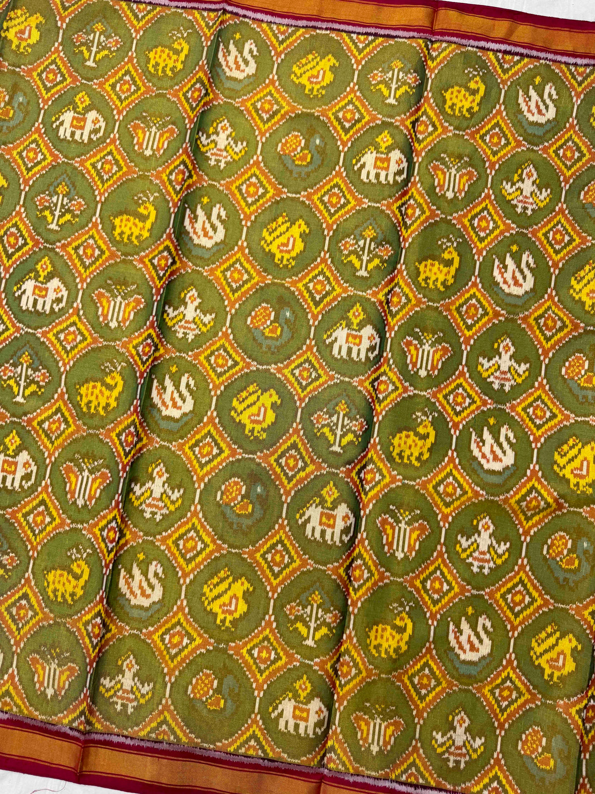 Maroon & Green Small Circle Narikunj Tissue Patola Saree