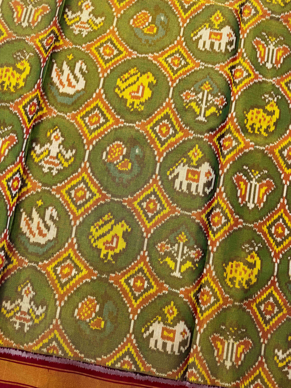 Maroon & Green Small Circle Narikunj Tissue Patola Saree