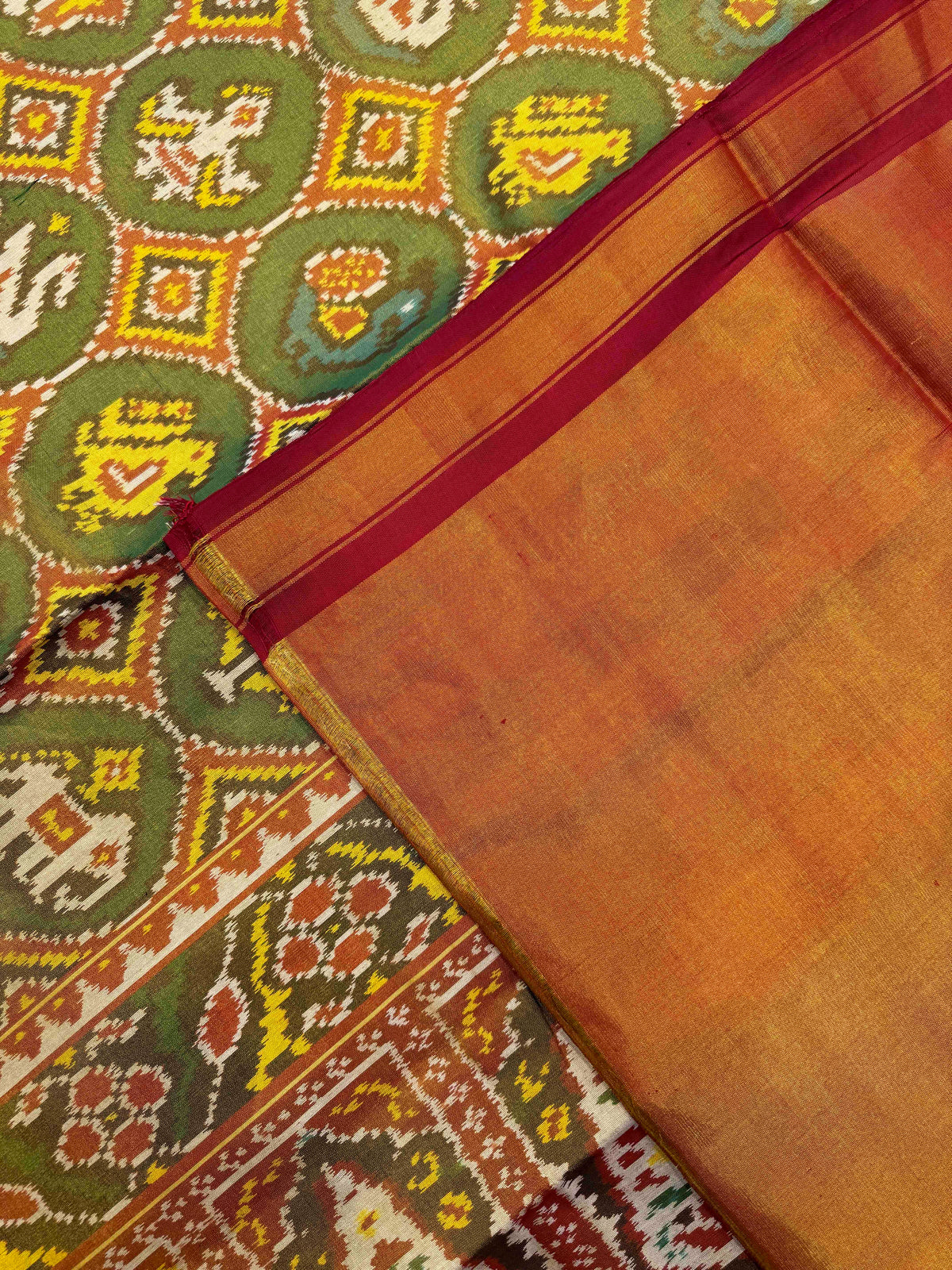 Maroon & Green Small Circle Narikunj Tissue Patola Saree