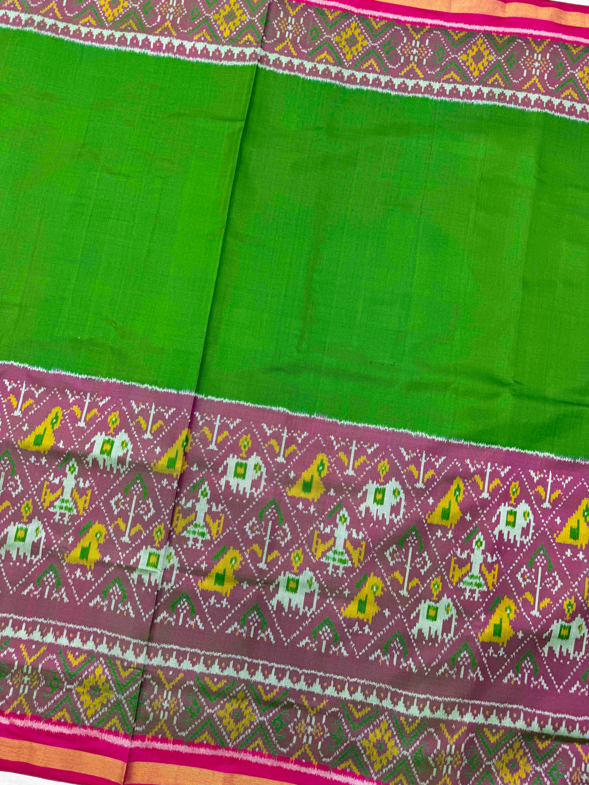 Pink & Green Plain with Narikunj Scut Border Rajkot Patola Saree