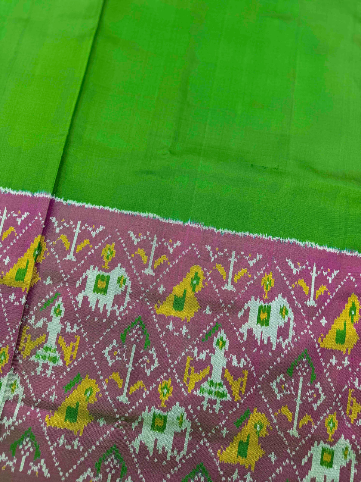 Pink & Green Plain with Narikunj Scut Border Rajkot Patola Saree