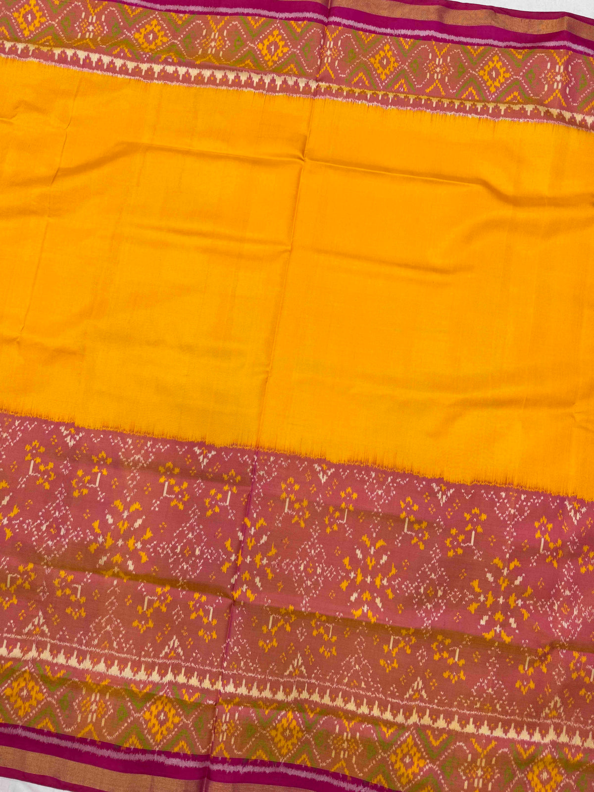Peach & Yellow Plain with Navratan Scut Border Rajkot Patola Saree