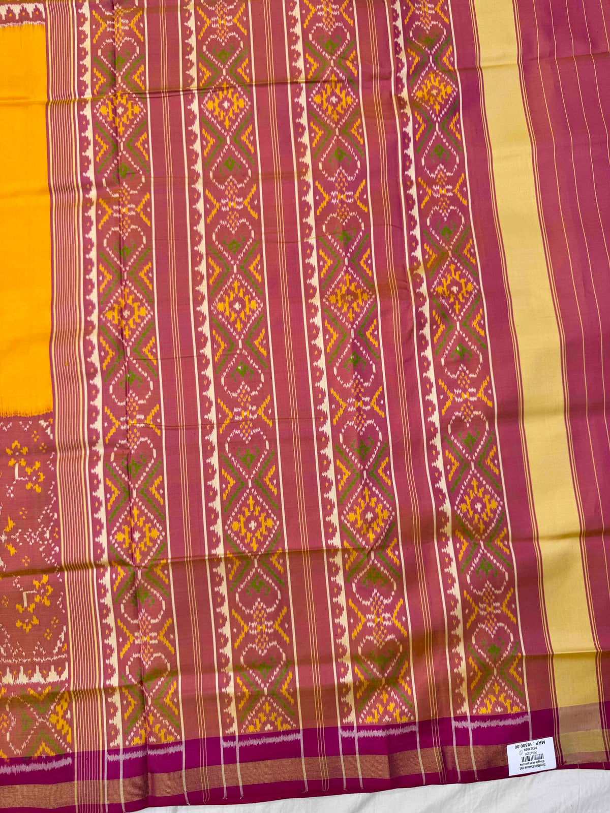 Peach & Yellow Plain with Navratan Scut Border Rajkot Patola Saree