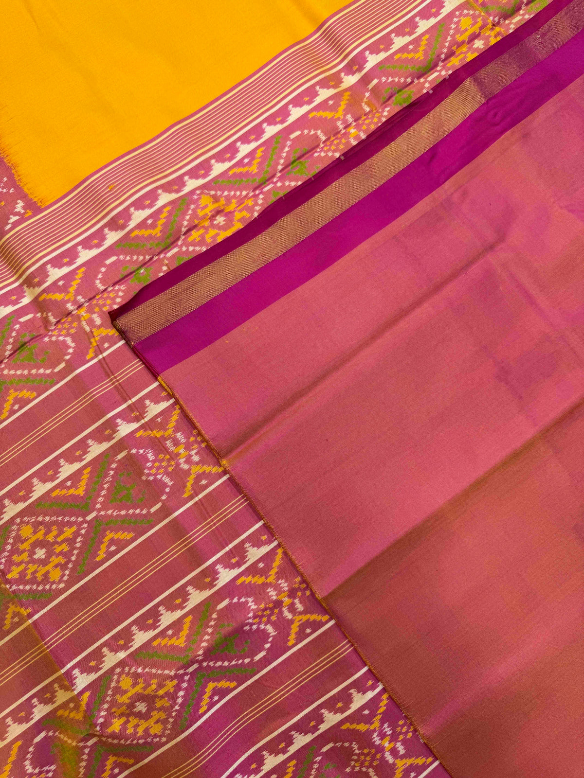 Peach & Yellow Plain with Navratan Scut Border Rajkot Patola Saree