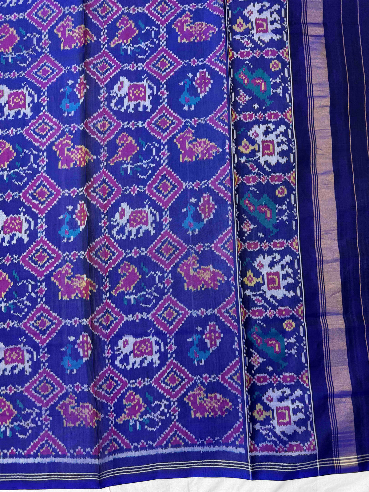 Purplish Blue Fancy Narikunj Semi Double Ikat Patola Dupatta