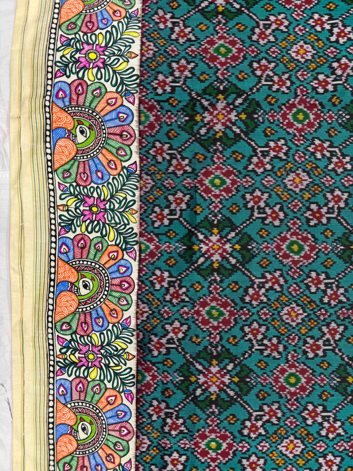 Off White & Turquoise Green Navratan Madhubani Hand Painting with Fusion Design Single Ikat Patan Patola Saree