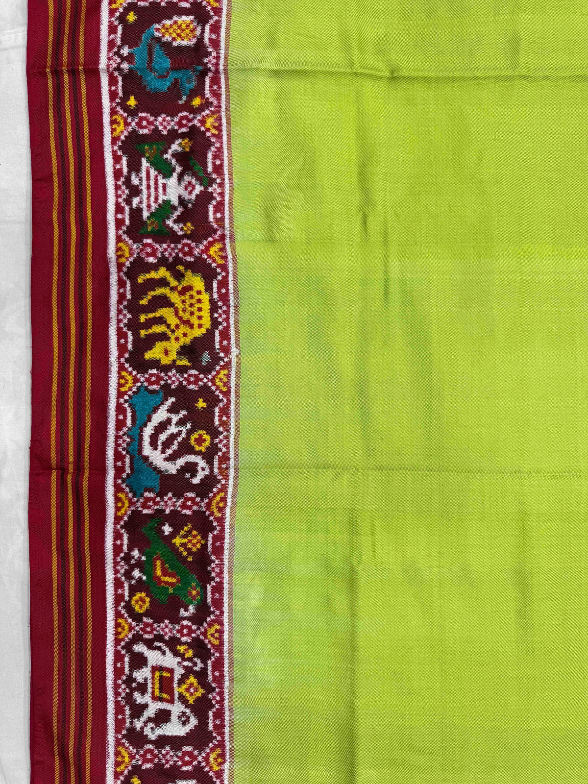Maroon & Light Paroot Green Plain with Narikunj Border Pallu Double Ikat Patan Patola Saree