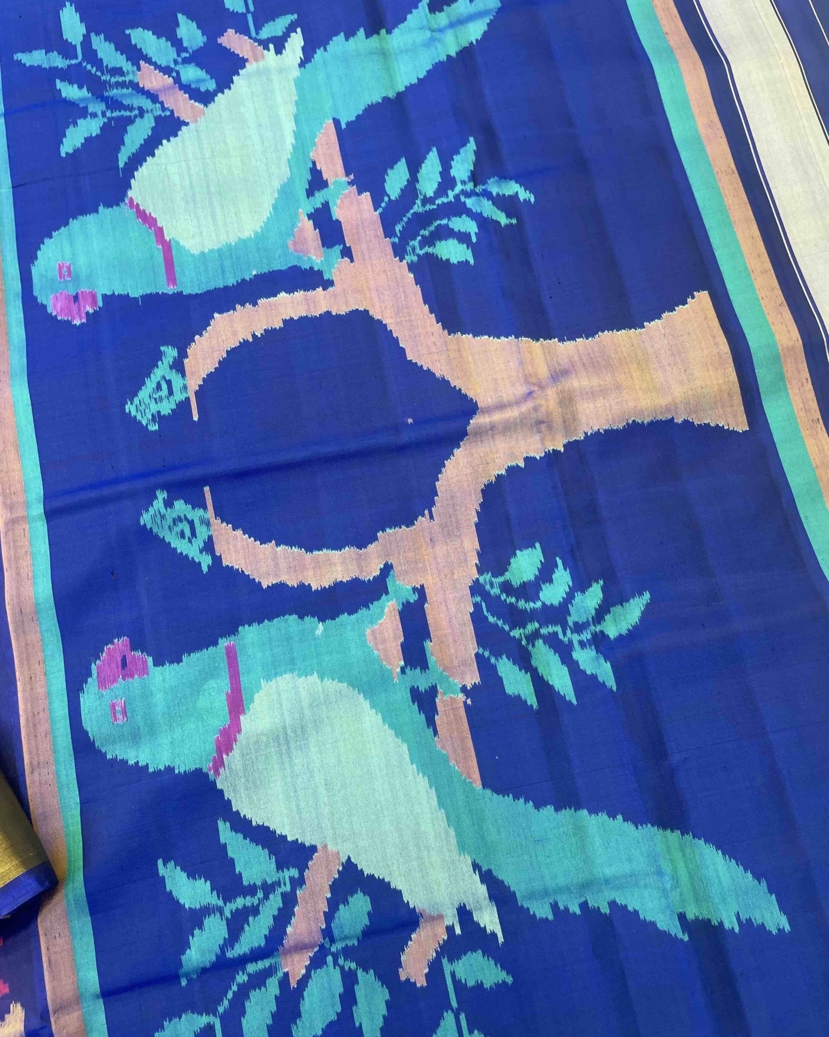 Blue & Purle Fancy Flower with Parrot Pallu Patola Saree - SindhoiPatolaArt