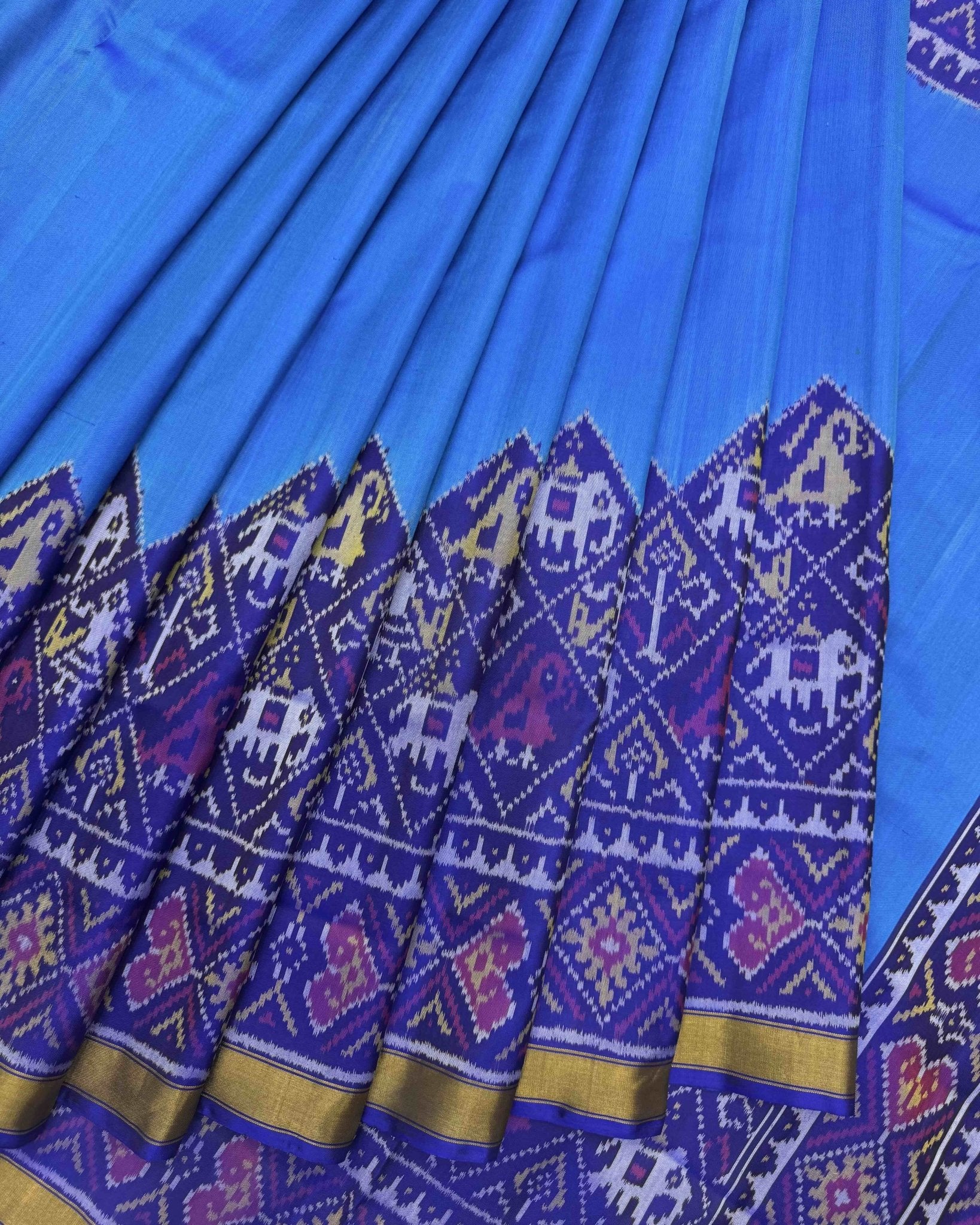 Blue & Sky Plain with Narikunj Scut Border Patola Saree - SindhoiPatolaArt
