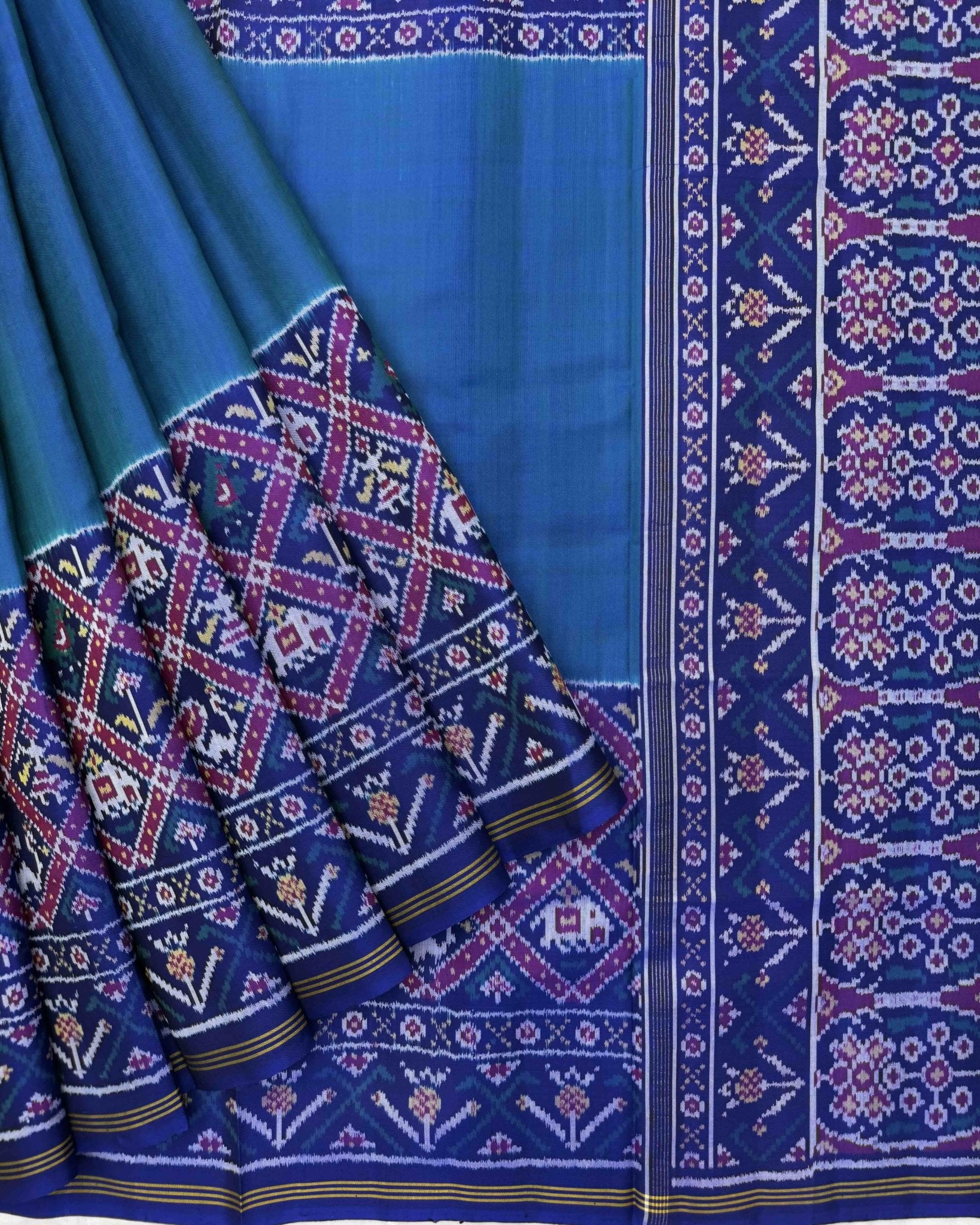 Blue & Turquoise Plain with Narikunj Scut Border Semi Double Ikat Patola Saree - SindhoiPatolaArt