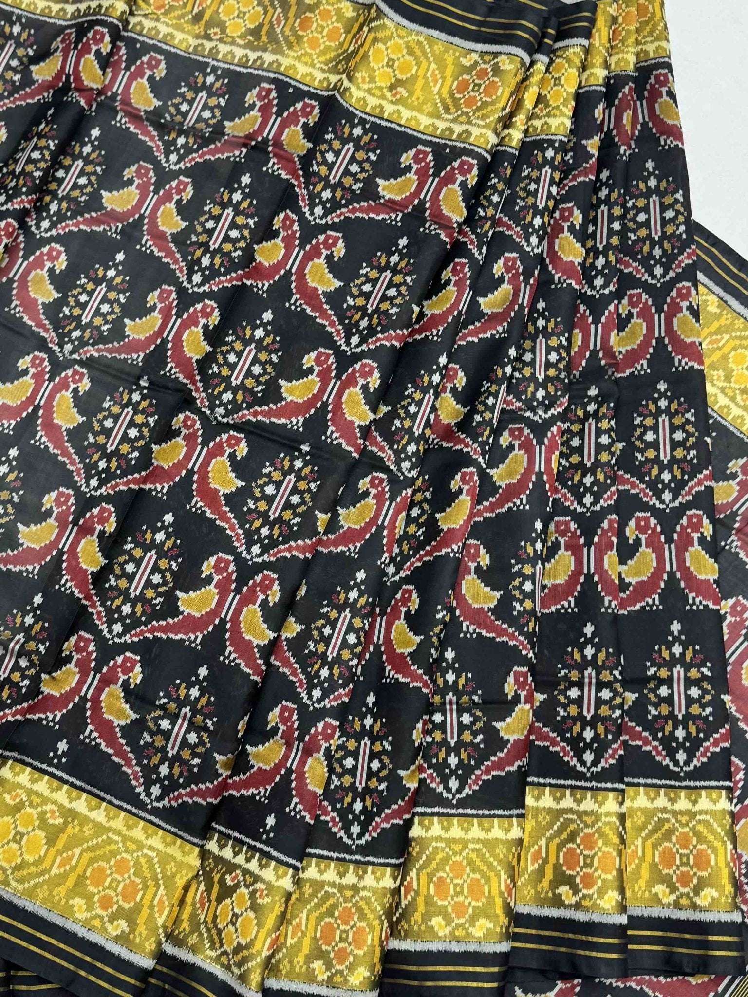 Parrot design black tissue border Patola saree - SindhoiPatolaArt