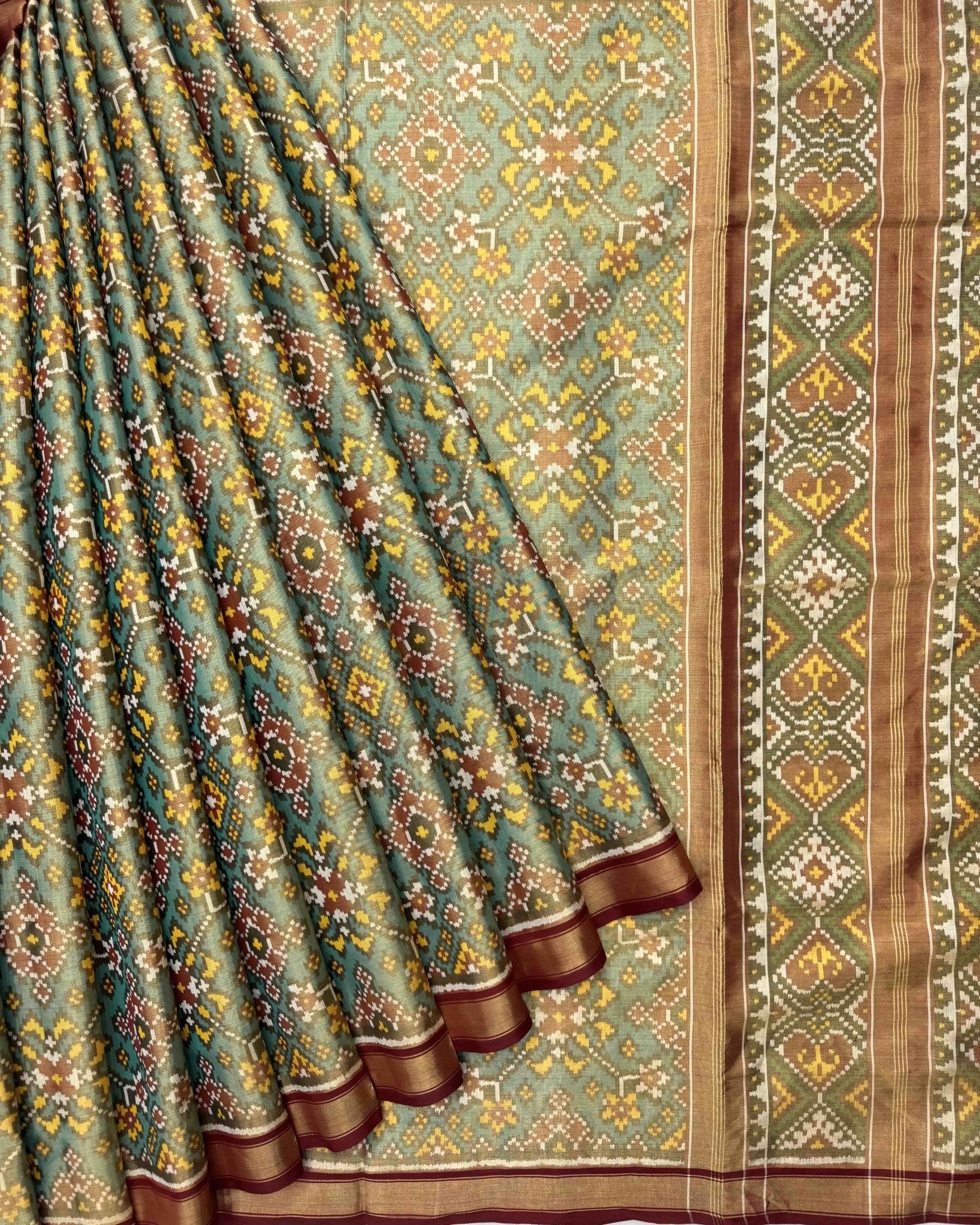 Sea Green Navratan Tissue Patola Saree - SindhoiPatolaArt