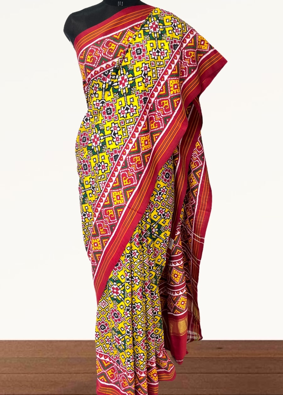 Yellow double ikat patola saree with navratna design - SindhoiPatolaArt