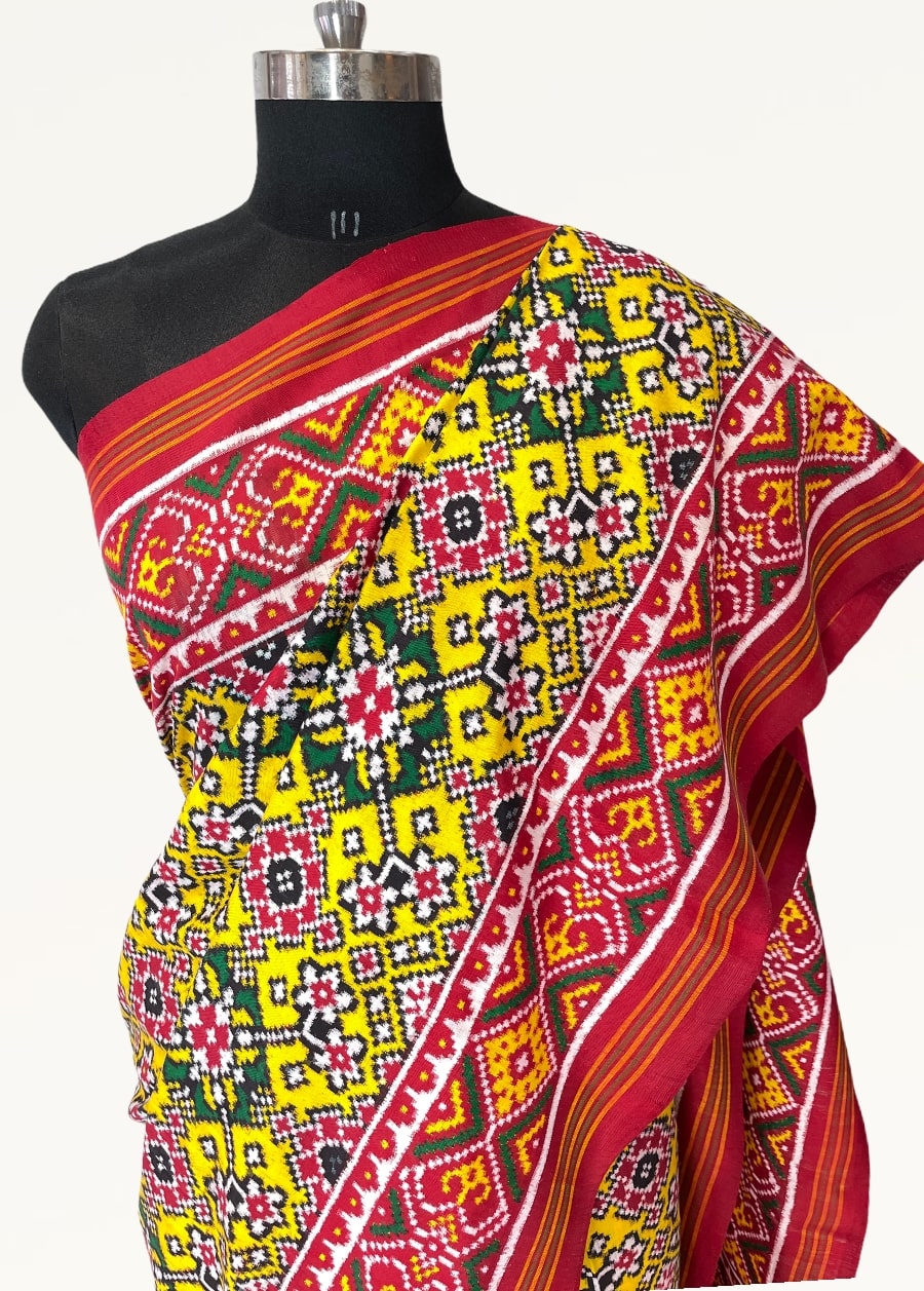 Yellow double ikat patola saree with navratna design - SindhoiPatolaArt