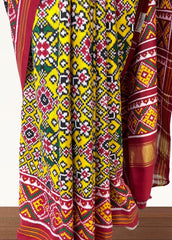 Yellow double ikat patola saree with navratna design - SindhoiPatolaArt
