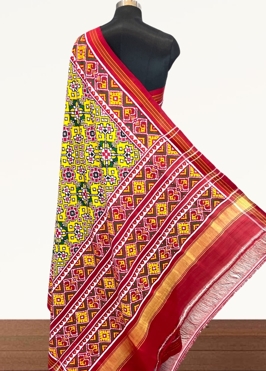 Yellow double ikat patola saree with navratna design - SindhoiPatolaArt