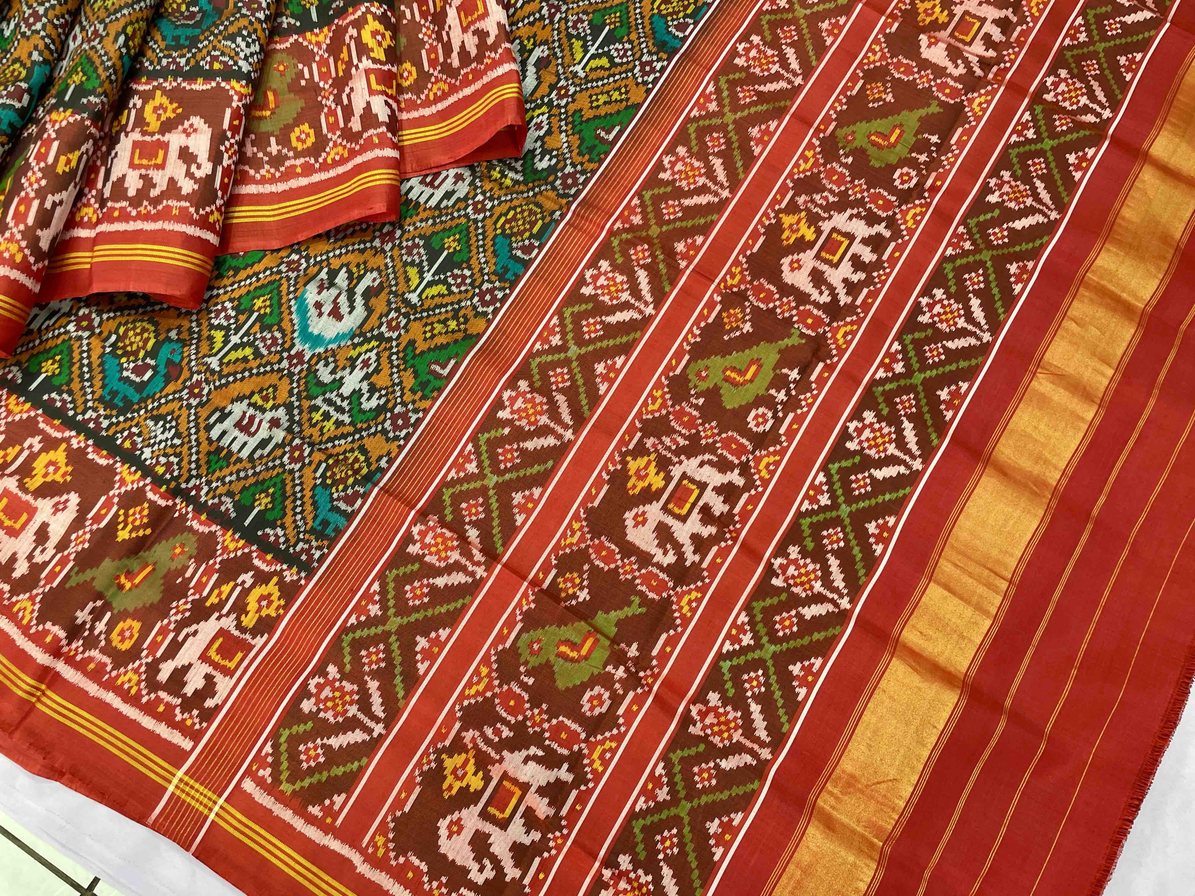 Orenge narikunj design red pallu patola saree - SindhoiPatolaArt