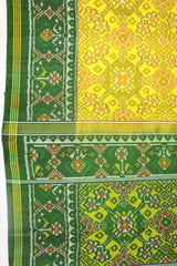 yellow navratna patola saree with green pallu - SindhoiPatolaArt