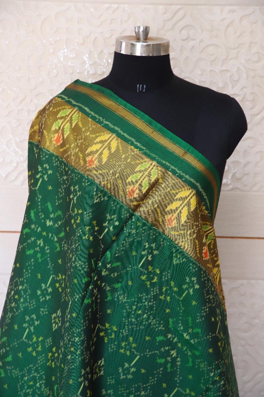 Traditional Navratna design in green colour - SindhoiPatolaArt