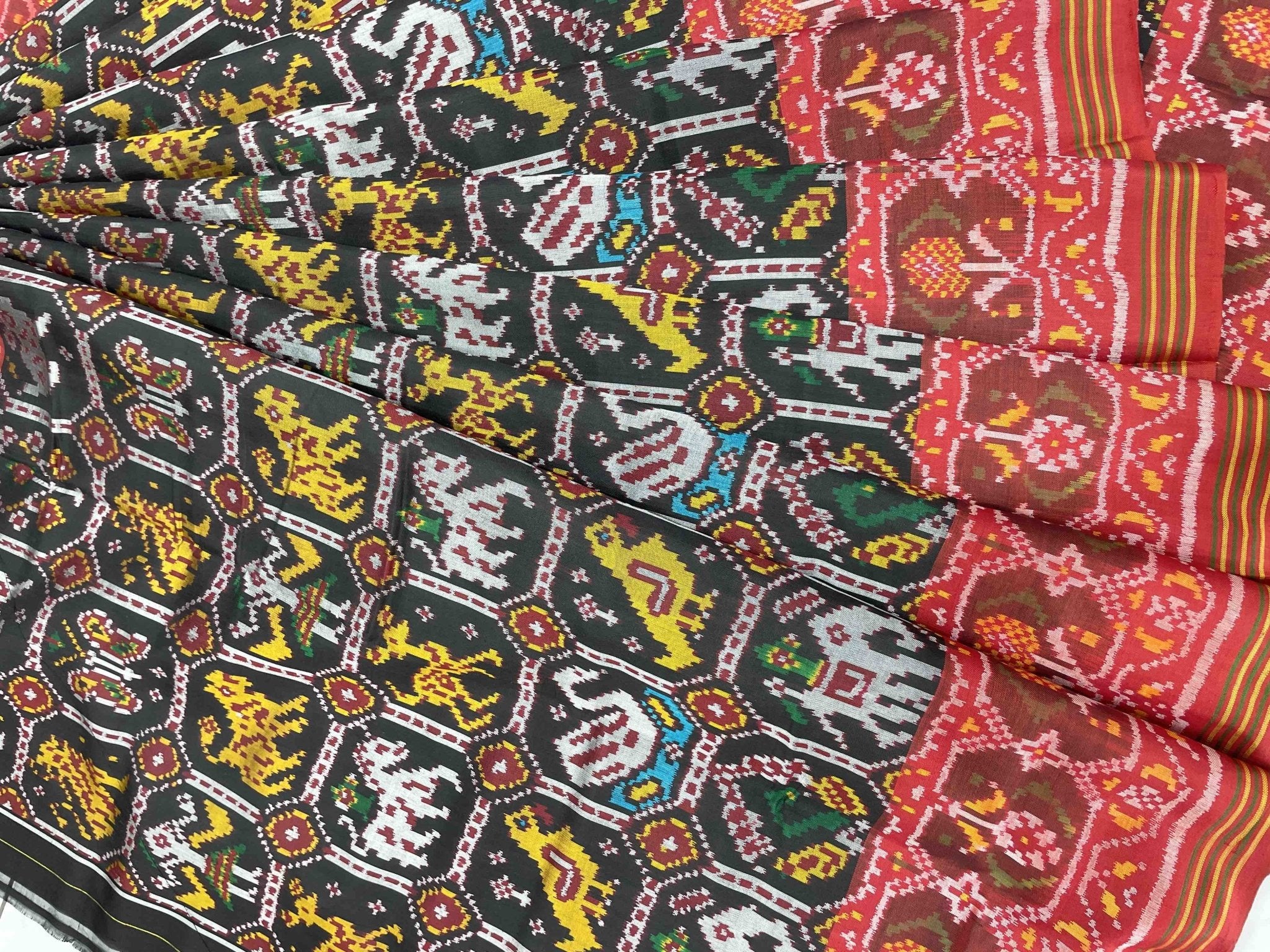 Black narikunj design with red pallu patola saree - SindhoiPatolaArt