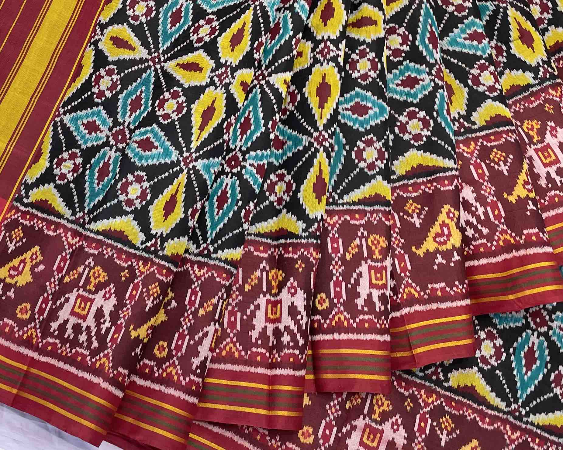 black new fancy design with traditional red narikunj pallu patola saree - SindhoiPatolaArt