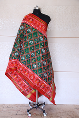 Semi double ikat dupatta in traditiona Hathi Popat design in Green and Red colour - SindhoiPatolaArt